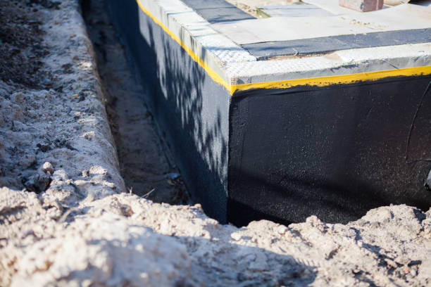 Professional Waterproofing technician working in Westmont, NJ